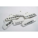 SIX VARIOUS GLAZED / PART-GLAZED POTTERY BIN LABELS The largest one 5.75"  (14.5 cms) long  (6)