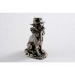 A VICTORIAN CAST NOVELTY PEPPERETTE in the form of Toby (Mr Punch's dog), with pull-off head, by