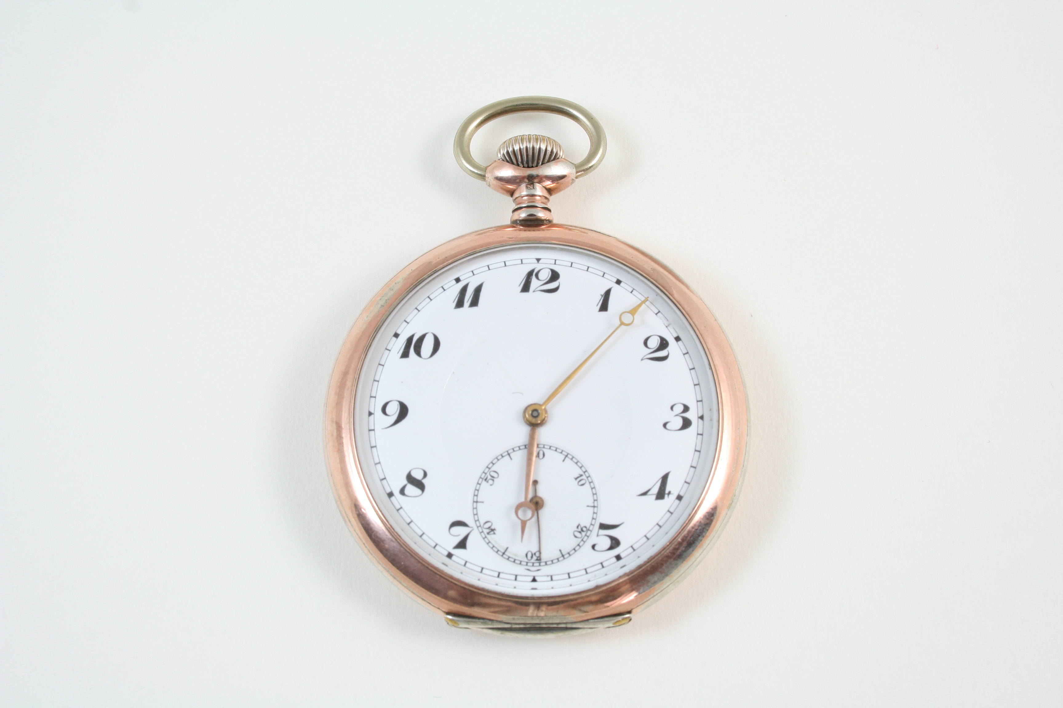 A SILVER OPEN FACED POCKET WATCH the white enamel dial with Arabic numerals and subsidiary seconds