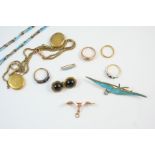 A QUANTITY OF JEWELLERY including a gold and cabochon garnet brooch, a 9ct. gold ring set with a