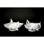 PAIR OF FIRST PERIOD WORCESTER SAUCEBOATS a pair of two handled double lipped sauceboats, polychrome