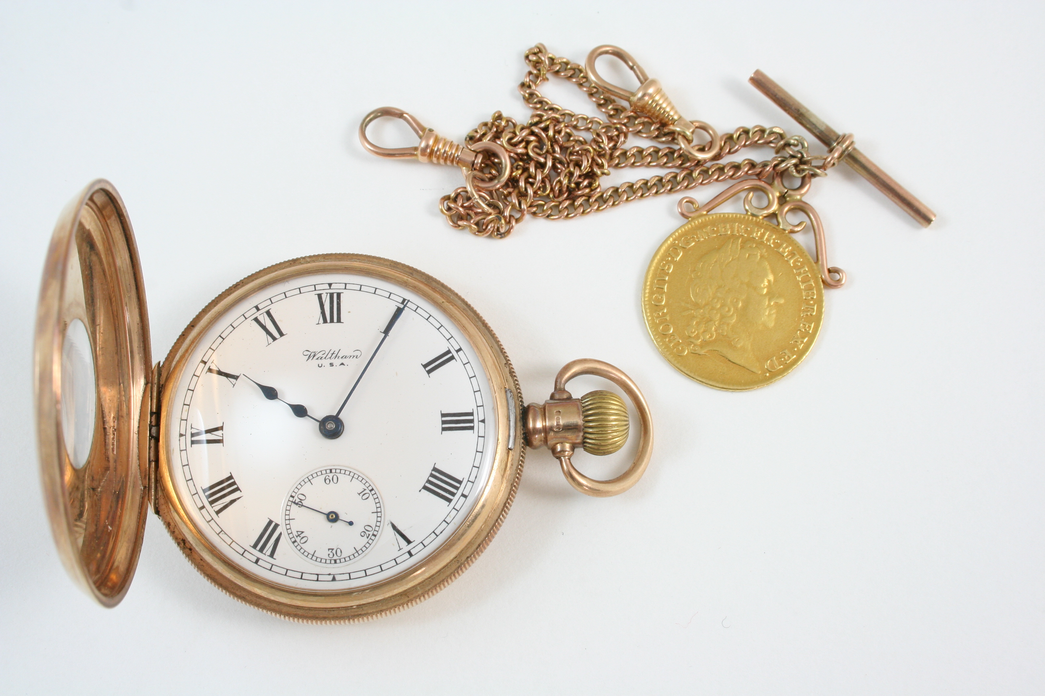 A 9CT. GOLD HALF HUNTING CASED POCKET WATCH BY WALTHAM the signed white enamel dial with Roman