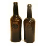 TWO SEALED WINE BOTTLES of brownish green metal with seal DBD 1836 and Lin Col C R Oxon 11.75" (