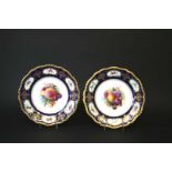 PAIR OF ROYAL WORCESTER PLATES - BAGNALL each plate painted with a central panel of fruit and