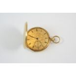 AN 18CT. GOLD FULL HUNTING CASED POCKET WATCH the gold foliate dial with Roman numerals and