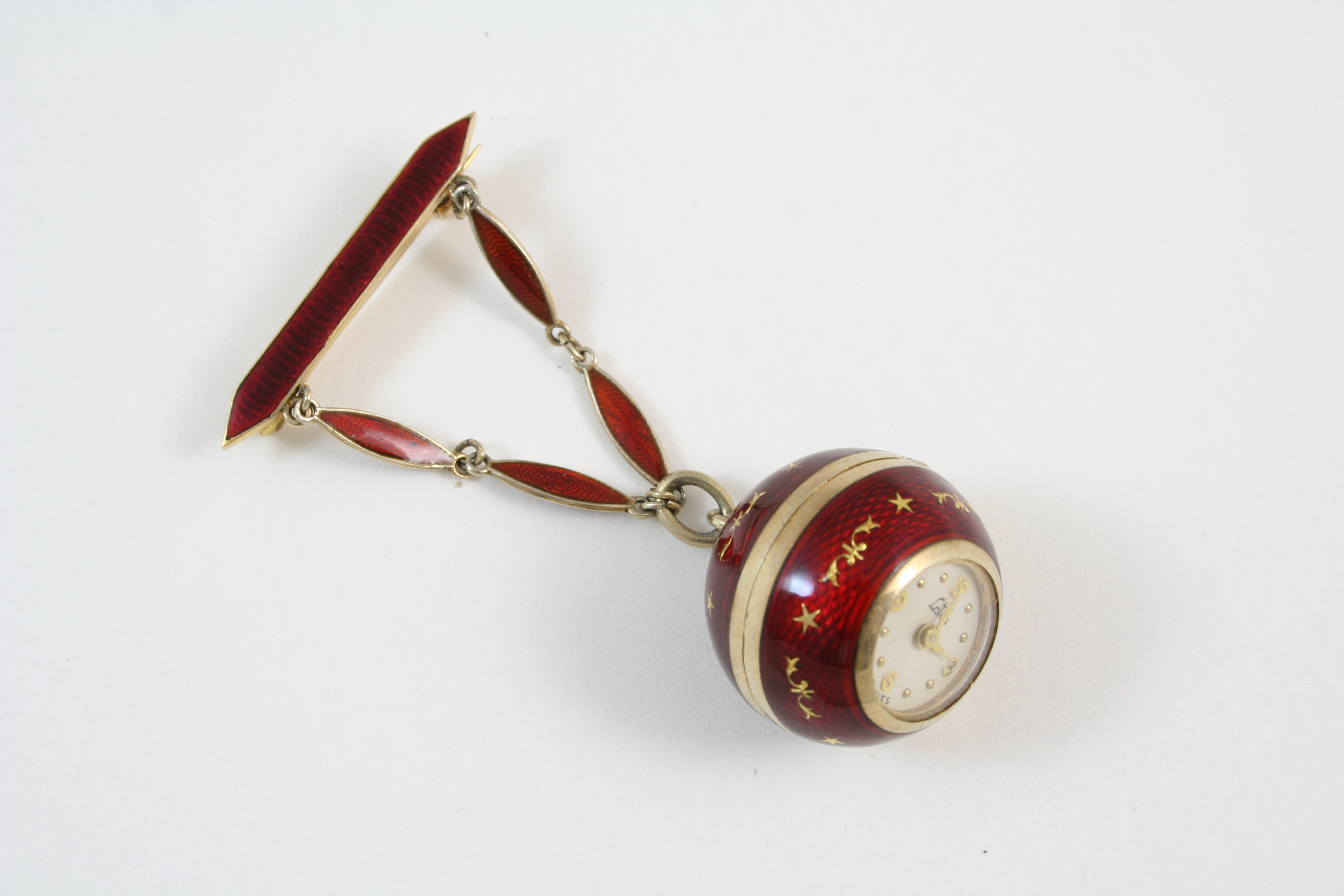 A SWISS GOLD AND RED GUILLOCHE ENAMEL FOB WATCH the circular dial with Arabic quarters and dot