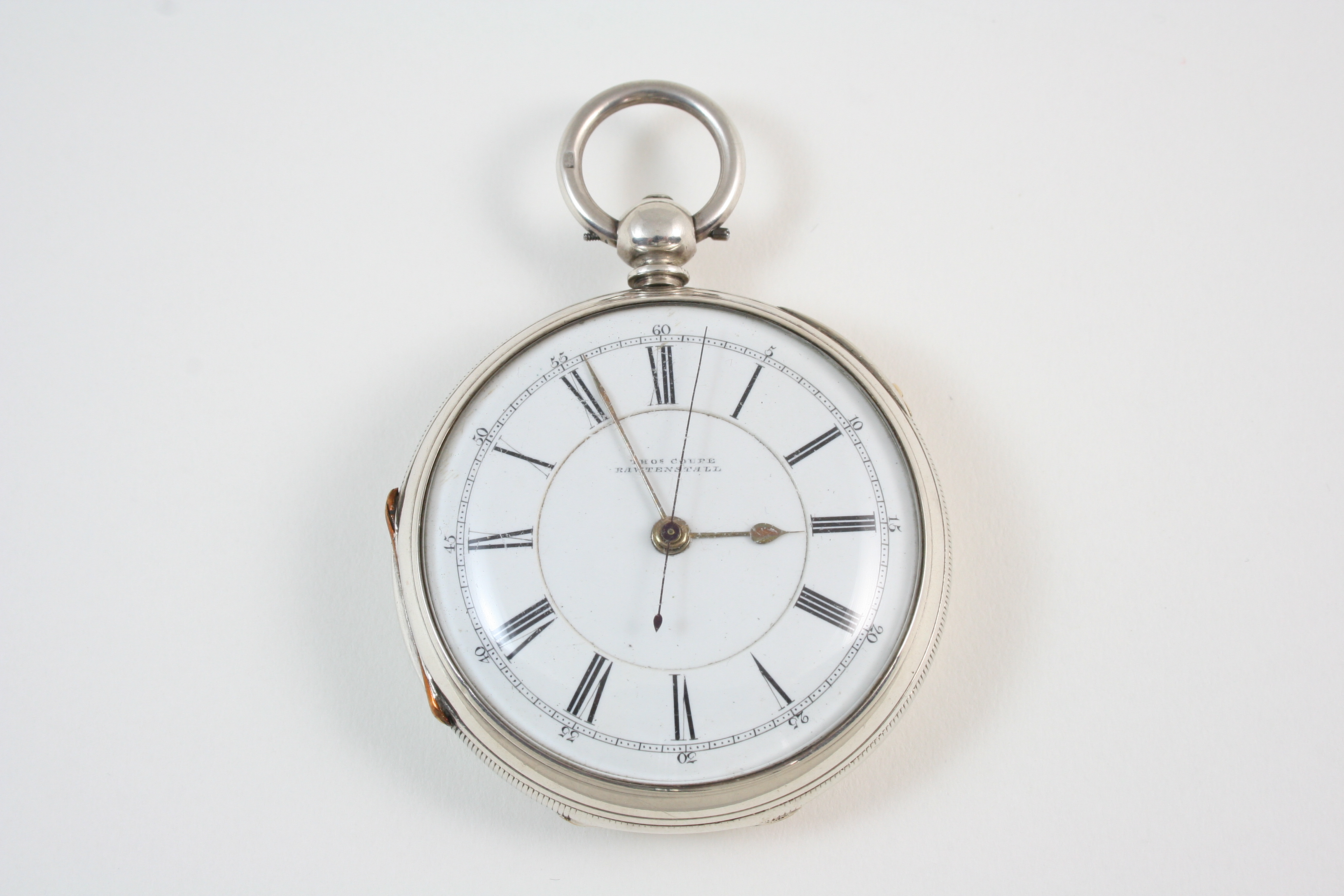 A SILVER STOP WATCH BY THOS COUPE, RAWTENSTALL the signed circular dial with Roman numerals,