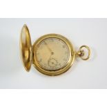 AN ART DECO GOLD PLATED FULL HUNTING CASED POCKET WATCH the circular dial with Arabic numerals and