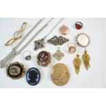 A QUANTITY OF JEWELLERY including a carved lava cameo brooch, a Victorian black onyx and gold