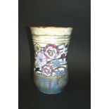 ROYAL DOULTON VASE - HARRY SIMEON a tube lined stoneware vase with a floral design. Impressed marks,