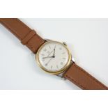A GENTLEMAN'S STAINLESS STEEL AND GOLD WRISTWATCH BY UNIVERSAL GENEVE the signed circular dial