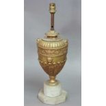 A GILT BRASS LAMP BASE in the form of an ovoid classical vase on a marble base 13" (33cm)