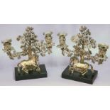 A PAIR OF CANDELABRA each for two lights with ormolu horse and serpent in front of an oak tree on