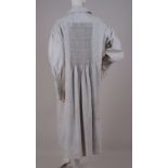 AN ORIGINAL EARLY VICTORIAN FARMERS SMOCK Very old, heavy cotton long farmer's smock coat.