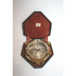 19THC CASED GERMAN COMPASS - ROSPINI an interesting brass compass with a silvered dial and levels on