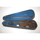 ANTIQUE VIOLIN & CASE the violin with a two piece back and carved scroll, with a spurious label
