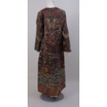 A 20TH CENTURY WOVEN CHINESE DRAGON ROBE. Woven silk with hidden brass button fastenings down the