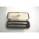 9CT GOLD FOUNTAIN PEN & PENCIL SET a 9ct gold fountain pen with 14k nib, also with a matching 9ct