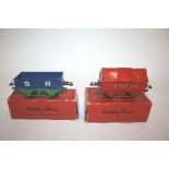 HORNBY 0 GAUGE two boxed 0 gauge wagons, No 0 Blue SR with tarpaulin frame, and Cement Wagon Red and