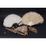 FOUR ANTIQUE FANS & A PARASOL. To include a white marabou fan in its box, a white ostrich feather on