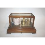 CASED BAROGRAPH a mahogany cased barograph, made by F Darton & Co Ltd, Watford. With two loose