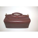 SWAINE & ADENEY GLADSTONE BAG an Ox-Blood leather vanity case, marked with a label for Swaine,