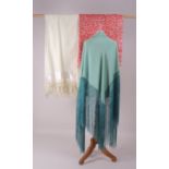 A COLLECTION OF ANTIQUE SHAWLS To include a red and white hand-printed shawl with wool fringe. A