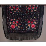 THREE VICTORIAN SHAWLS A piano shawl embroidered in silk onto a black silk ground, with fringing all