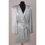A VINTAGE SATIN GENTLEMAN'S SMOKING JACKET This heavy satin smoking jacket was made and worn in