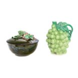 * Two Decorative Articles   comprising a bottle in the form of a grape cluster and a covered