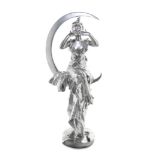 A Continental Silver Painted Cast Metal Figure   20th century   depicting a lady in the moon.