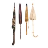 A Collection of Twenty Victorian Umbrellas and Parasols   various decorations, forms and sizes.