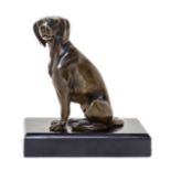 * A Bronze Figural Card Holder   19th/20th century   in the form of a seated hound, raised on a