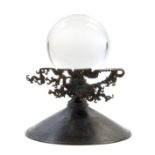 * A Japanese Bronze Usabata Base   with a glass gazing ball.   Height overall 9 1/4 inches.