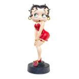 An English Porcelain Figure   circa 2006   titled The Red Purse, depicting Betty Boop on a stepped