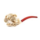 A Carved Meerschaum Pipe   19th/20th century   worked with two lions beneath a tree, in a fitted