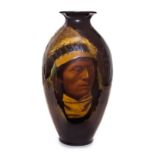 * A Roseville Rozane Pottery Vase   arthur williams   depicting a portrait of a Native American