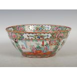 A Chinese porcelain Canton famille rose bowl, late Qing Dynasty, decorated with panels of figures