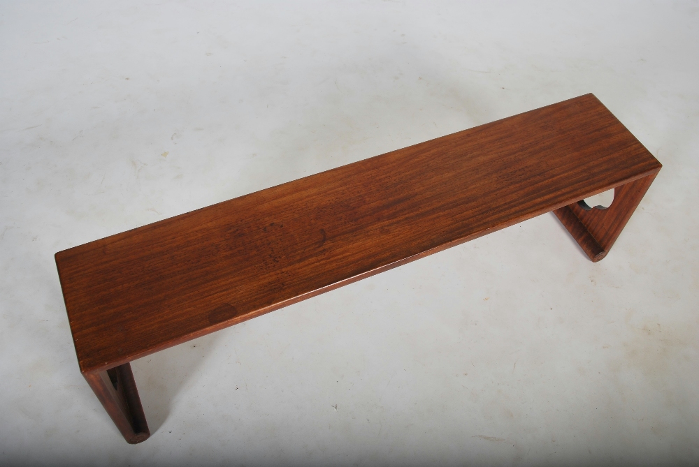 A Chinese dark wood bench, 20th century, of plain rectangular form with pierced quartrefoil - Image 2 of 2