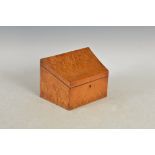 A Victorian bird's eye maple stationery box, the hinged cover opening to an interior of two