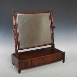 A 19th century mahogany dressing table mirror, the rectangular mirror plate within turned uprights