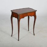 A late 19th/ early 20th century rosewood, boxwood lined and gilt metal mounted writing table, the