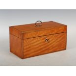 A 19th century satinwood and boxwood lined tea caddy, the hinged cover opening to a fitted