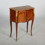A late 19th century French kingwood, marquetry inlaid and ormolu mounted serpentine commode, the