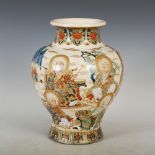 A Japanese Satsuma pottery vase, Meiji Period, decorated with Lohan figures picked out in coloured