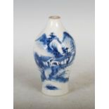 A Chinese porcelain blue and white vase, Qing Dynasty, decorated with pavilions in a mountain