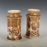 A pair of Japanese Satsuma pottery hexagonal-shaped vases, Meiji Period, decorated with shaped
