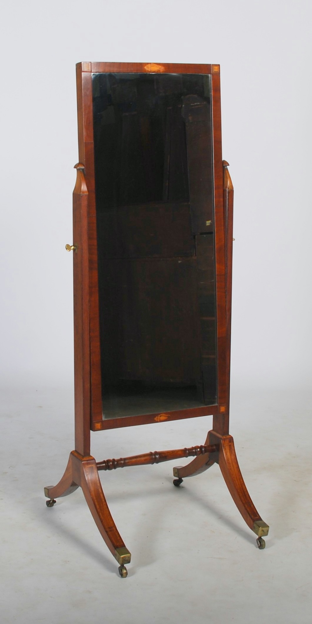 A 19th century mahogany and satinwood banded cheval mirror, the rectangular mirror plate raised on