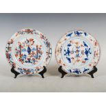 Two Chinese porcelain Imari plates, Qing Dynasty, one decorated with a scroll and vase issuing