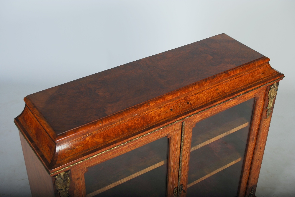 A Victorian burr walnut and gilt metal mounted bookcase, the rectangular top above a concave - Image 3 of 3